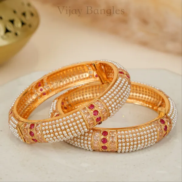 Gold_And_White_Copper_Pearl_Embellished_Festive_Bangles_For_Women_Set_Of_2