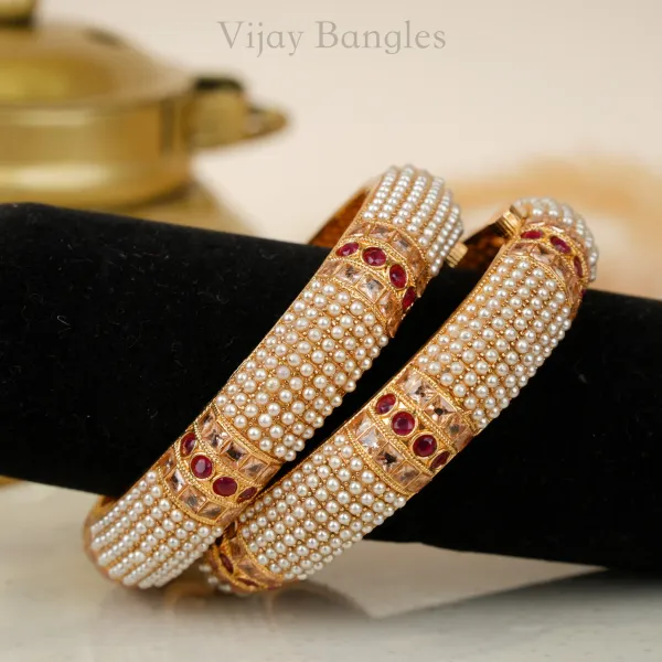 Gold_And_White_Copper_Pearl_Embellished_Festive_Bangles_For_Women_Set_Of_2