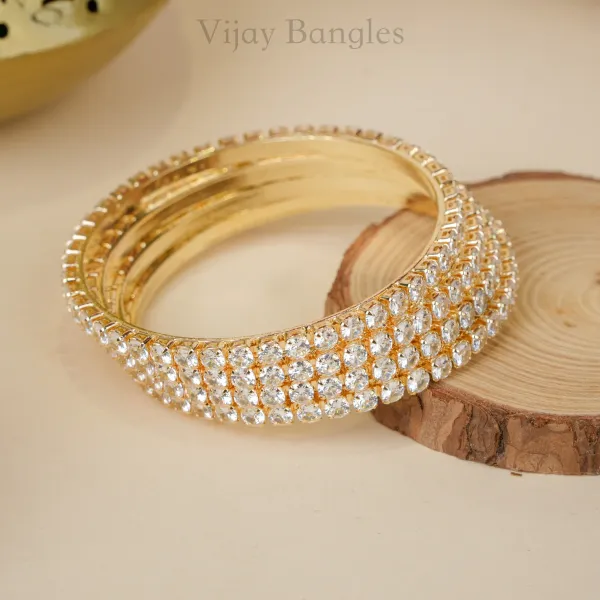 Gold_And_White_Brass_Alloy_Round-Cut_American_Diamond_Slim_Bangles_For_Women_Set_Of_4