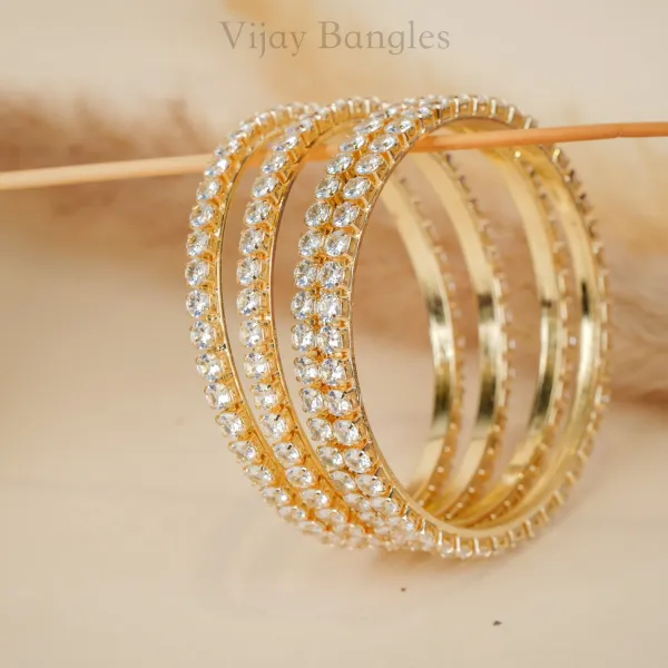 Gold_And_White_Brass_Alloy_Round-Cut_American_Diamond_Slim_Bangles_For_Women_Set_Of_4