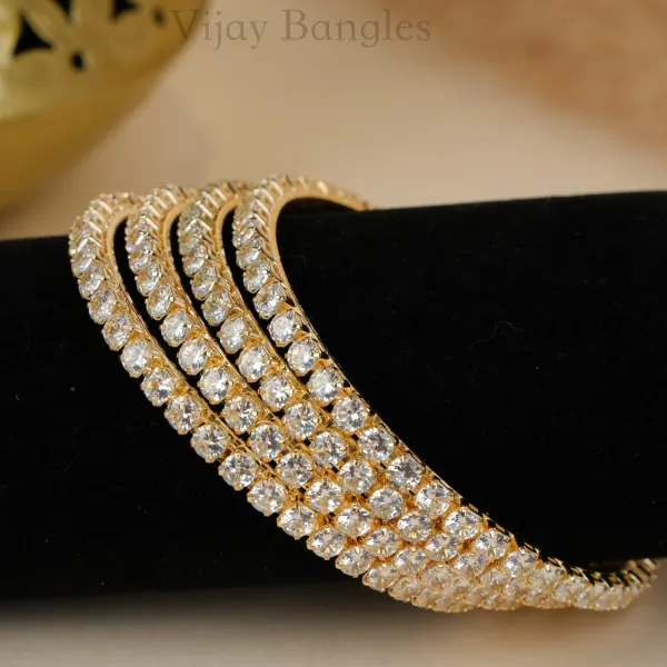 Gold_And_White_Brass_Alloy_Round-Cut_American_Diamond_Slim_Bangles_For_Women_Set_Of_4