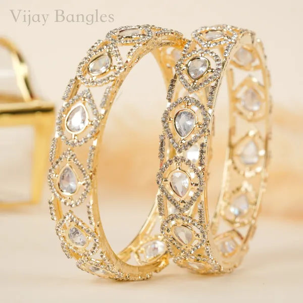 Gold_And_White_Brass_Alloy_Pear_American_Diamond_Openwork_Bangles_For_Women_Set_Of_2