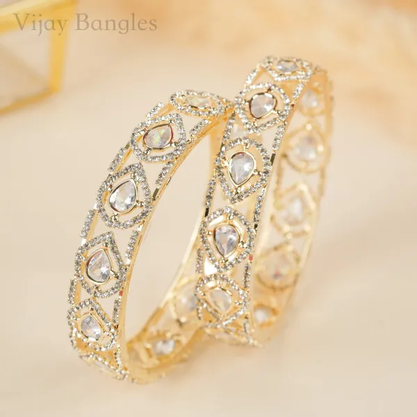 Gold_And_White_Brass_Alloy_Pear_American_Diamond_Openwork_Bangles_For_Women_Set_Of_2