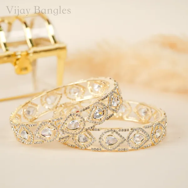 Gold_And_White_Brass_Alloy_Pear_American_Diamond_Openwork_Bangles_For_Women_Set_Of_2