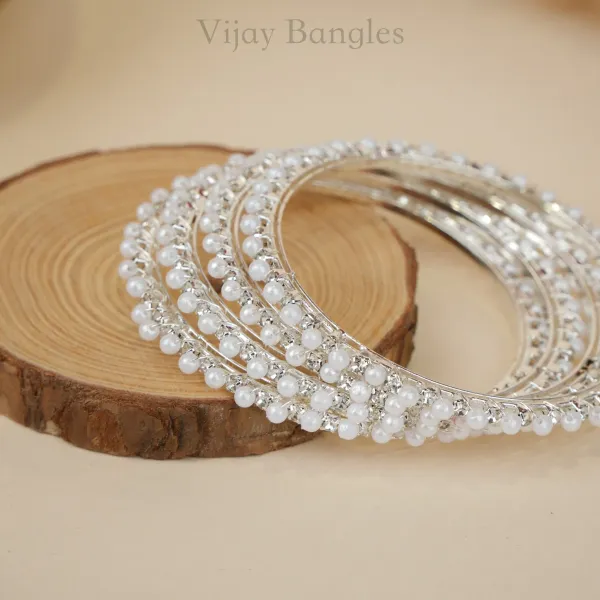 Silver_And_White_Brass_Alloy_Pearl_American_Diamond_Bangles_For_Women_Set_Of_4