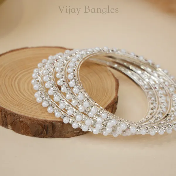 Silver_And_White_Brass_Alloy_Pearl_American_Diamond_Bangles_For_Women_Set_Of_4
