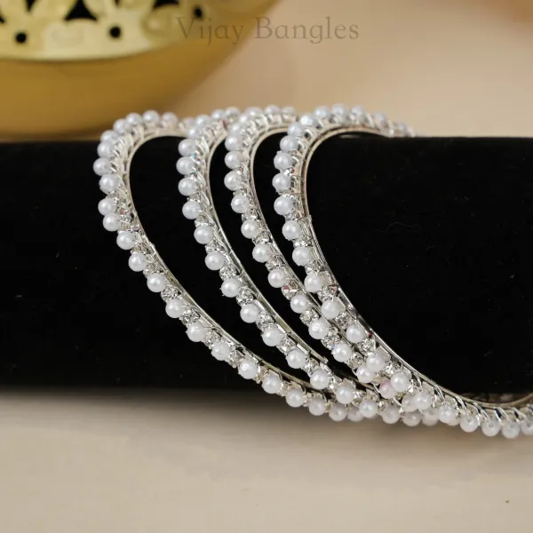 Silver_And_White_Brass_Alloy_Pearl_American_Diamond_Bangles_For_Women_Set_Of_4