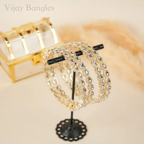 Gold_And_White_Brass_Alloy_Teardrop_Kundan_Festive_Bangles_For_Women_Set_Of_4