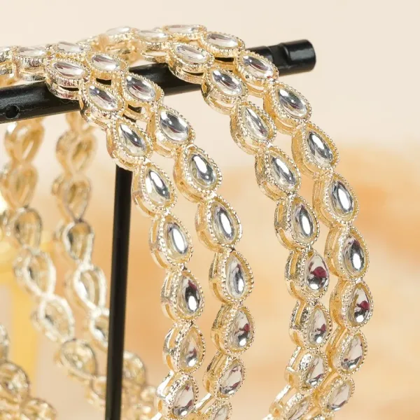 Gold_And_White_Brass_Alloy_Teardrop_Kundan_Festive_Bangles_For_Women_Set_Of_4