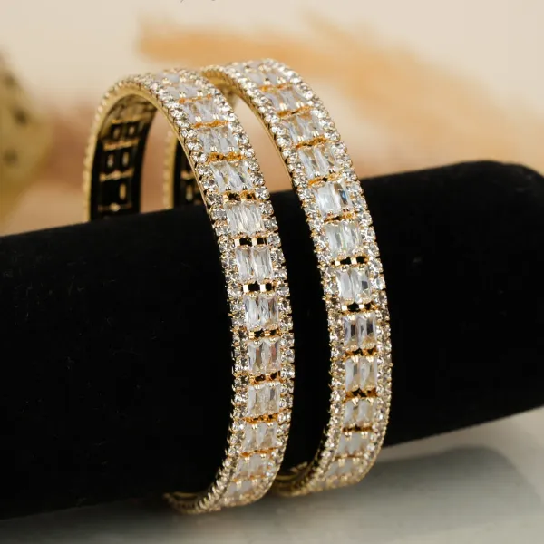 Gold_And_White_Brass_Alloy_Baguette_American_Diamond_Slim_Bangles_For_Women_Set_Of_2