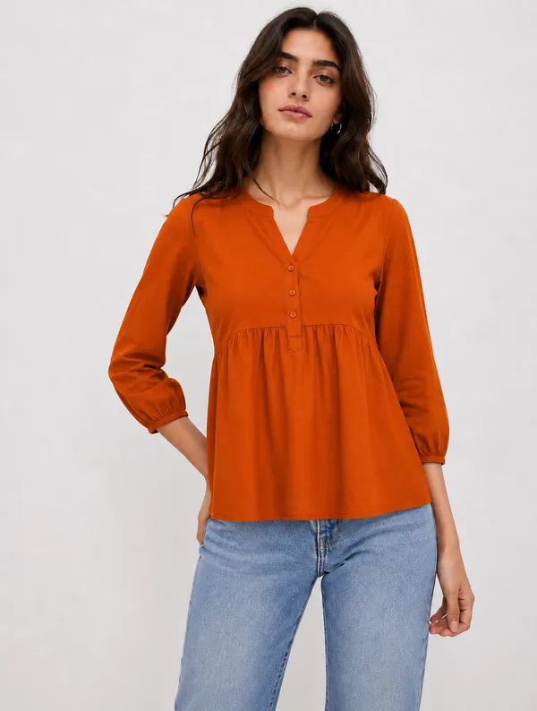 Orange_Cotton_Relaxed_Fit_Button_Front_Peplum_Top_For_Women