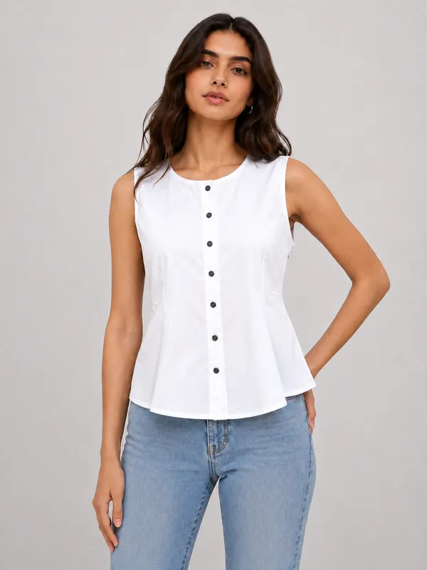 Elevate_your_everyday_wardrobe_with_this_classic_and_chic_White_Sleeveless_Peplum_Top._Crafted_for_a_crisp_yet_comfortable_look,_this_top_is_the_epitome_of_effortless_elegance,_seamlessly_transitioning_from_a_day_at_the_office_to_a_casual_weekend_outing.
