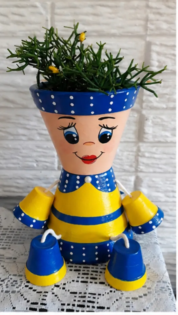Plastic_Whimsical_Girl_Shaped_Polka_Dot_Planter
