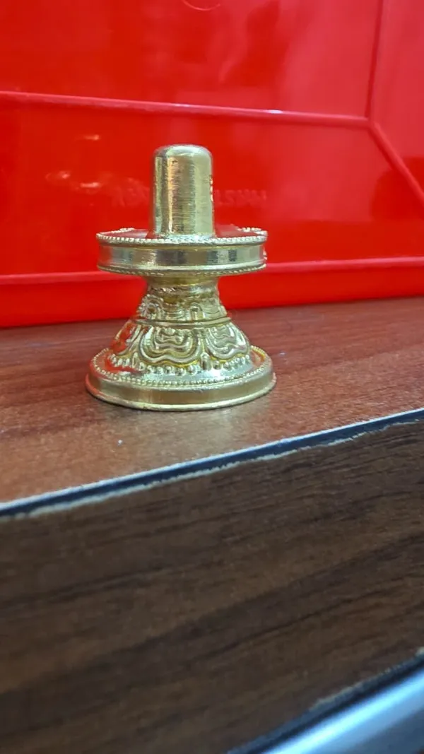 Brass_Shivling_with_Embossed_Detailing,_Gold_Finish