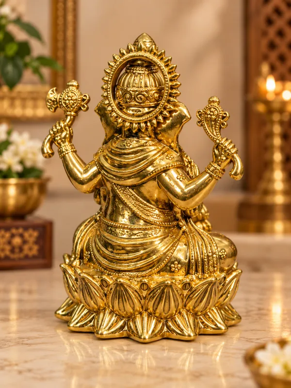 Lord_Ganesha_Seated_on_Lotus_-_Brass_Idol,_Gold_Finish