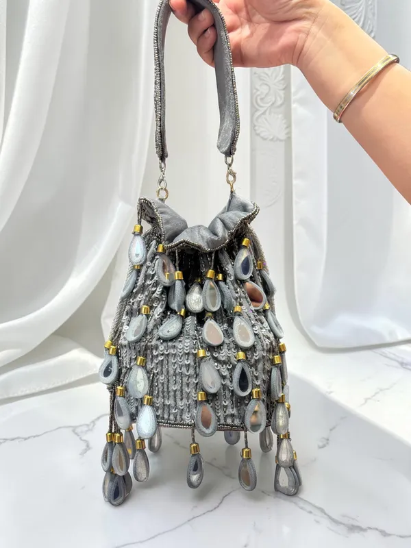 Grey_Synthetic_And_Leather_Sole_Potli_Bag_For_Women