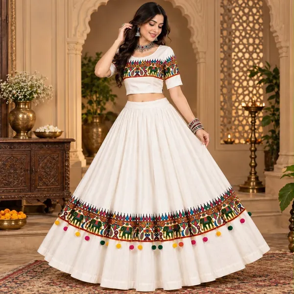 Ivory_White_Roman_Silk_Chaniya_Choli_with_Printed_Lace_&_Heavy_Ball_Latkan_–_Traditional_Navratri_Garba_Outfit_for_Women