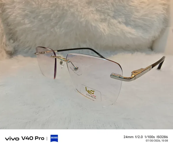 Rimless_Gold_And_Black_Eyeglasses