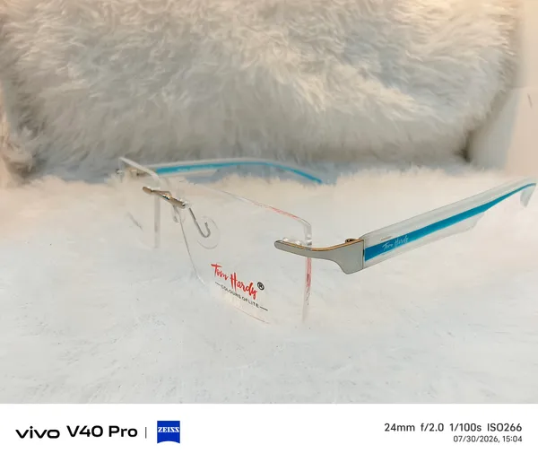 Transparent_Blue_Rimless_Eyeglasses