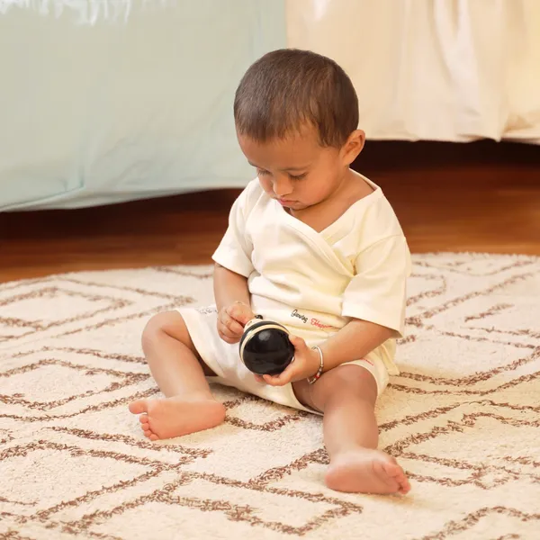 BuzzleBee™_Ivory_Wood_Balancing_Wobbler_Toy_For_Babies