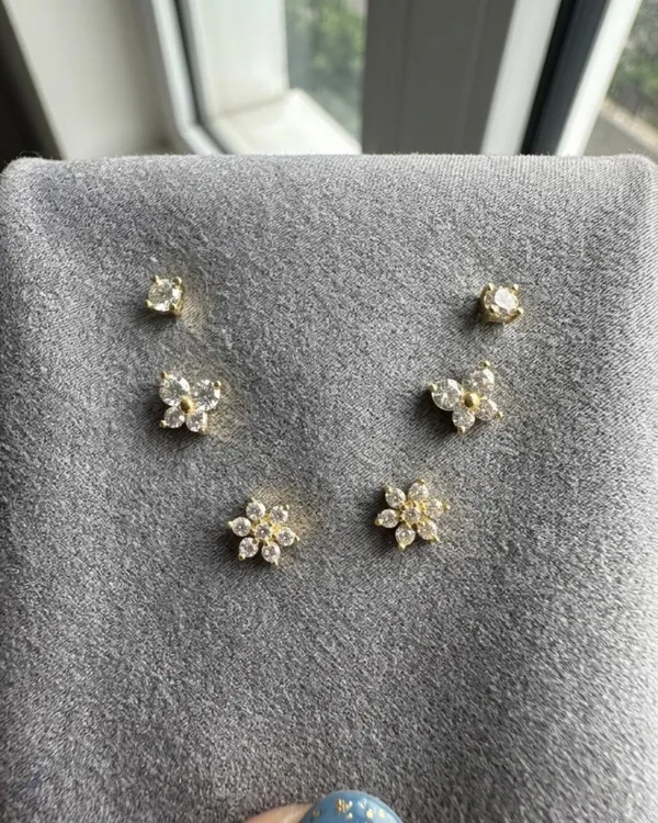 3-Pair_Floral_&_Solitaire_CZ_Stud_Earrings_Set_–_Elegant_Gold-Tone_Sparkle_Collection
