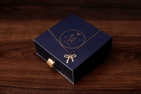 Golden_Grace_Bow_Pendant_Necklace