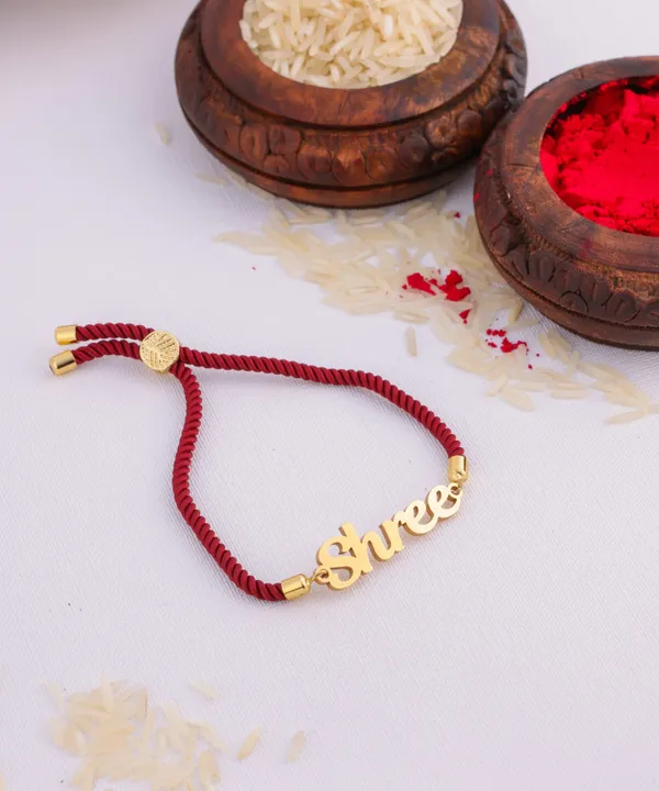 Personalized_Rakhi_Knotted_In_Marron_Thread