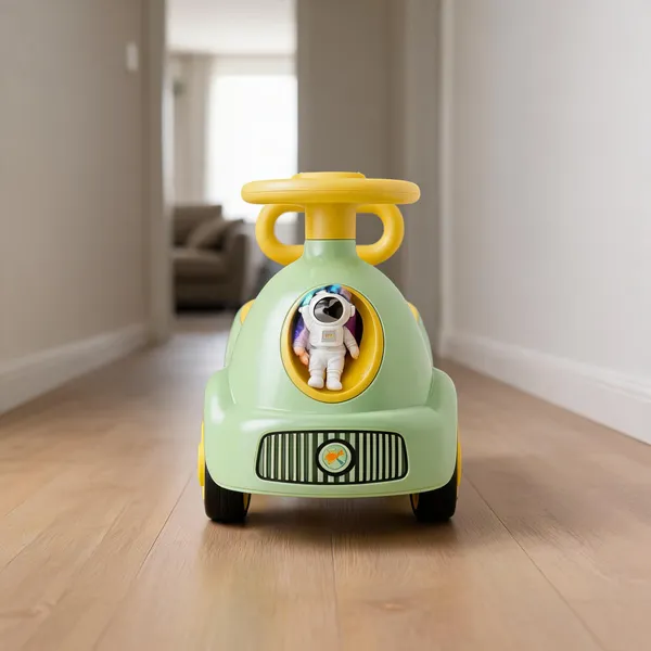 Green_Ride_On_Toy_Car_With_Steering_Wheel