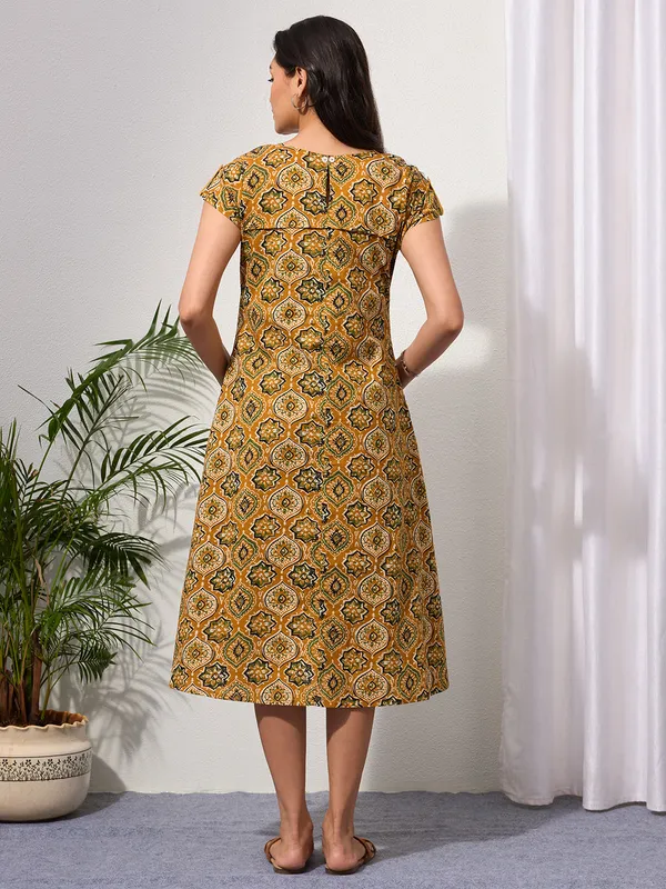 Mustard_Ethnic_Motifs_Midi_Dress_with_Embroidered_Patch_Pockets_&_Shoulder_Tabs