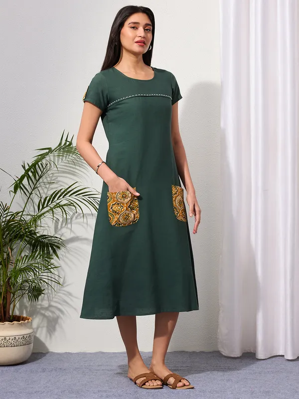 Pine_Green_Cotton_Linen_Dress_with_Ajrakh_Printed_Pockets