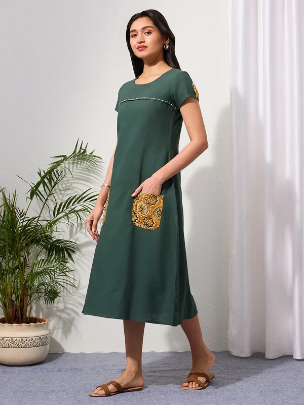 Pine_Green_Cotton_Linen_Dress_with_Ajrakh_Printed_Pockets