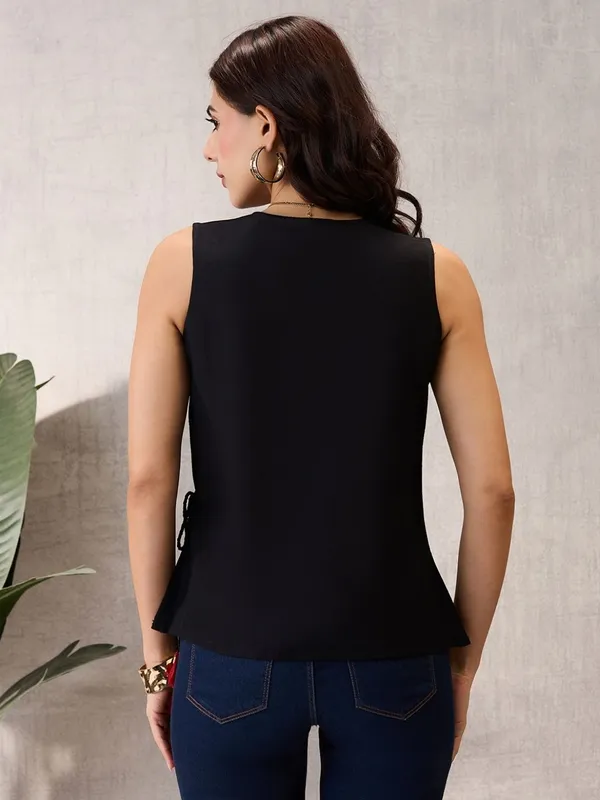 Black_Sleeveless_Wrap_Top_with_Geometric_Border