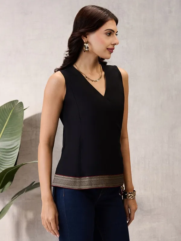 Black_Sleeveless_Wrap_Top_with_Geometric_Border