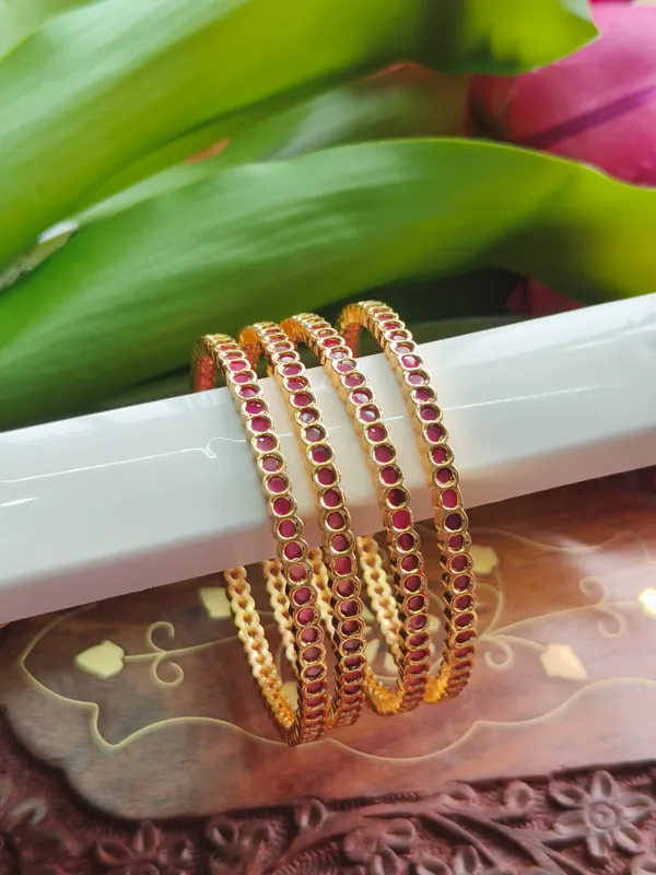 Gold_Tone_Pink_Stone_Bangles_For_Women_(_Pack_Of_4_)