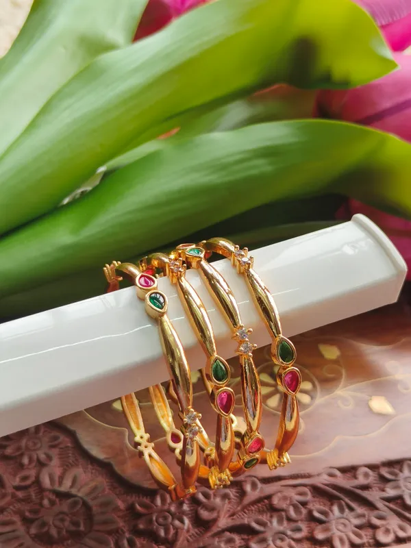 Gold_Tone_Stone_Studded_Bangle_Set_For_Women_(_Pack_Of_4_)