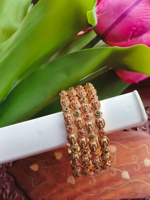 Gold_Tone_Embossed_Traditional_Bangles_For_Women_(_Pack_Of_4_)