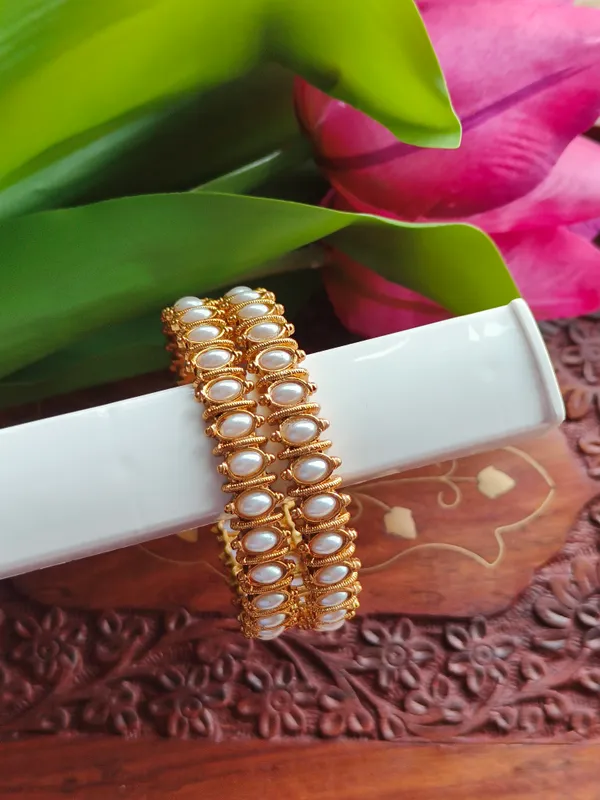 Gold_Tone_Pearl_Embellished_Bangle_Set_For_Women_(_Pack_Of_2_)