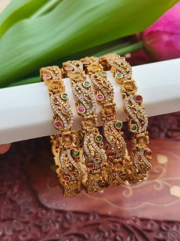 Gold_Tone_Leaf_Embellished_Bangles_for_Women_(_Pack_Of_4_)