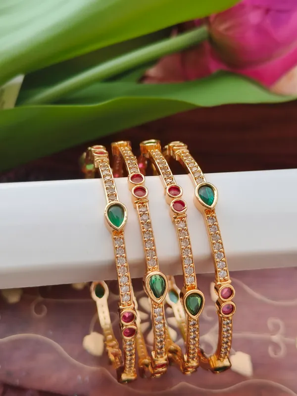 Gold_Tone_Stone_Studded_Bangles_Set_For_Women_(_Pack_Of_4_)