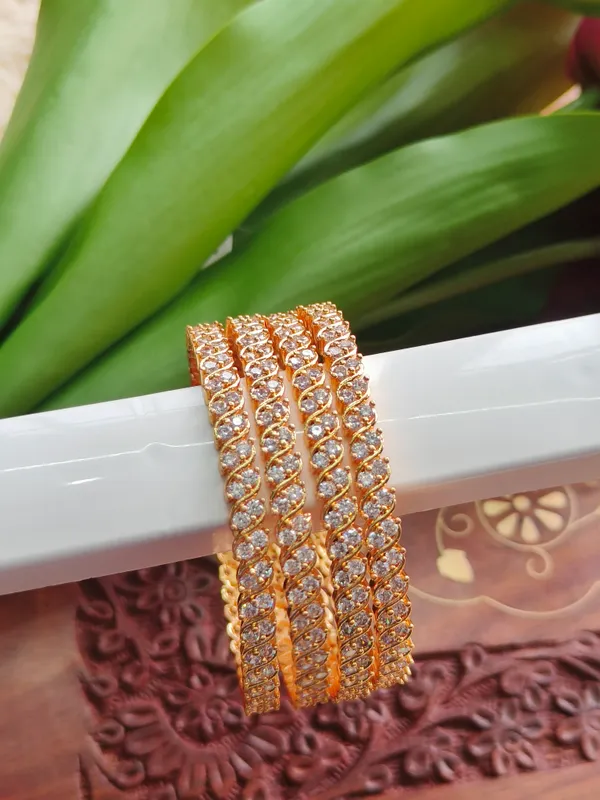 Gold_Tone_Stone_Studded_Bangle_Set_For_Women_(_Pack_Of_4_)