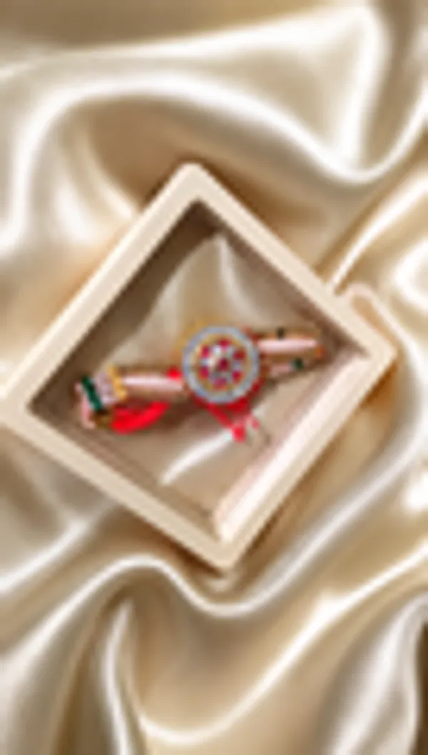 Shaalik_The_Essence_Rakhi_Hamper_Rakhi_Candle_Chocolates_12ml_Perfume_In_A_Pine_Box