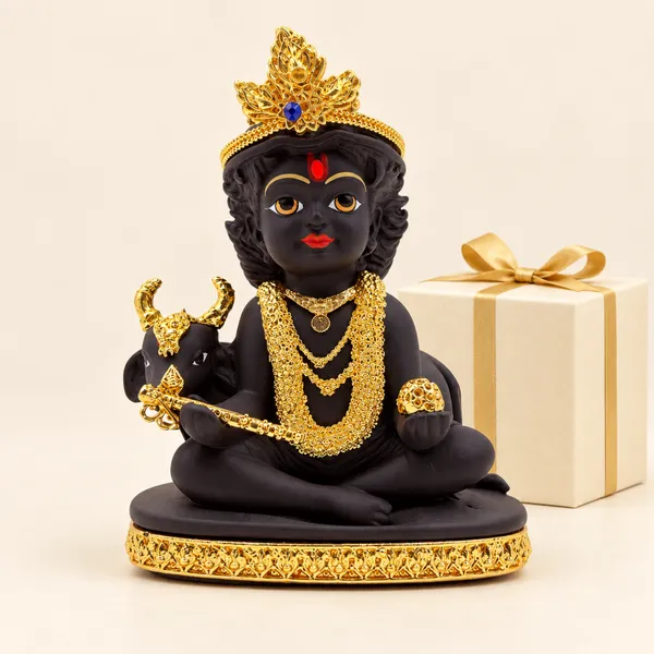 Black_and_Golden_Bal_Krishna_Idol_with_Cow_for_Pooja_Room,_Home_Décor_&_Gift
