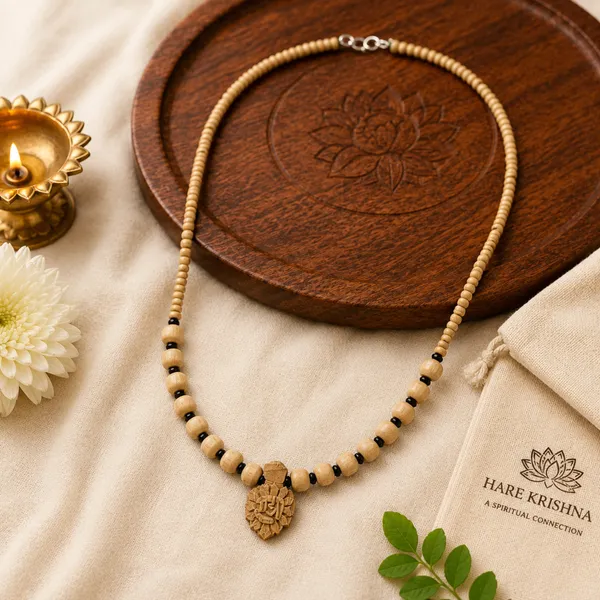 Natural_Tulsi_Beads_Necklace_with_Black_Spacers_and_Carved_Radha_Wooden_Pendant_|_Handcrafted_Devotional_Mala
