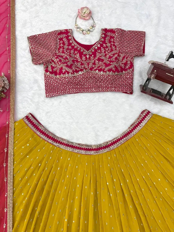 Pink_And_Mustard_Faux_Georgette_Embroidered_Lehenga_Choli_For_Women