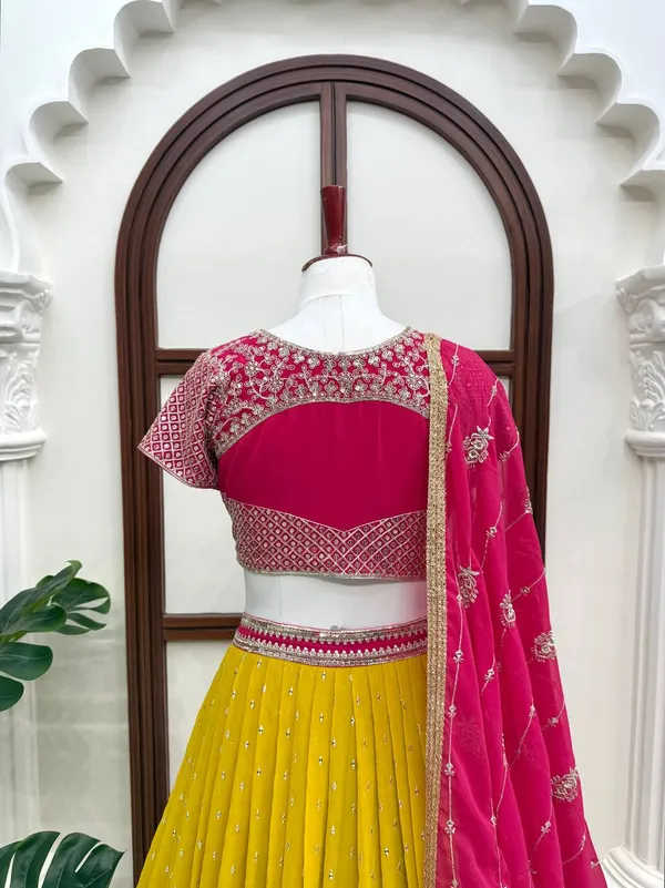 Pink_And_Mustard_Faux_Georgette_Embroidered_Lehenga_Choli_For_Women