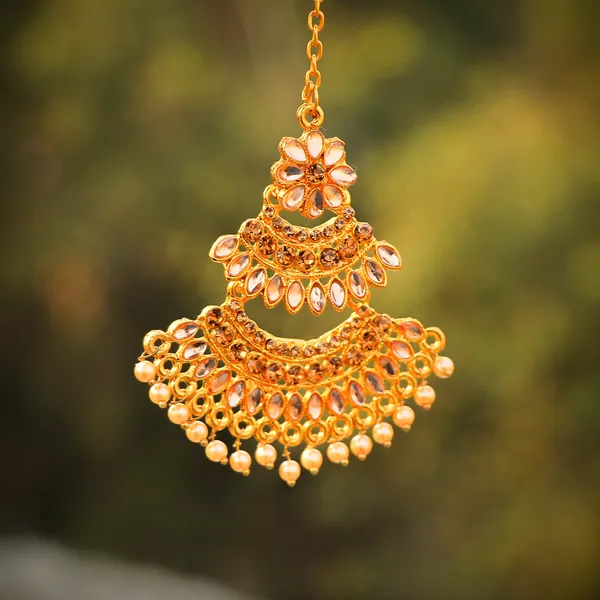 Gold_Tone_Floral_Layered_Earrings_And_Maang_Tikka_Set_For_Women