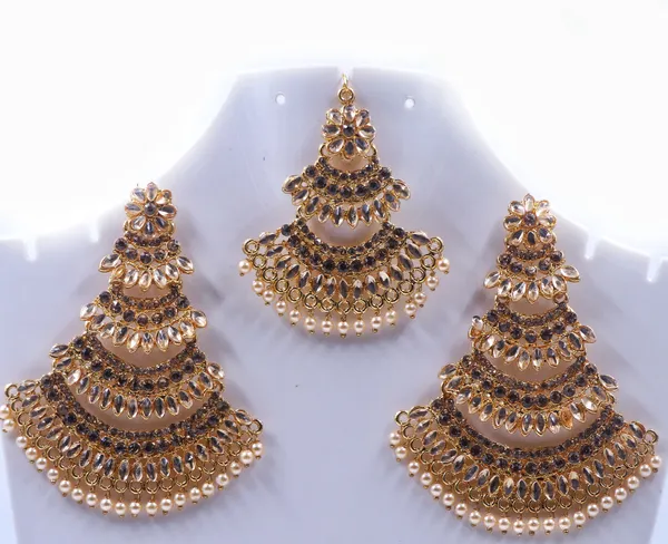 Gold_Tone_Floral_Layered_Earrings_And_Maang_Tikka_Set_For_Women