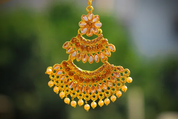 Gold_Tone_Floral_Layered_Earrings_And_Maang_Tikka_Set_For_Women