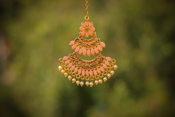 Peach_Gold_Tone_Layered_Necklace_Earrings_And_Maang_Tikka_Set_For_Women