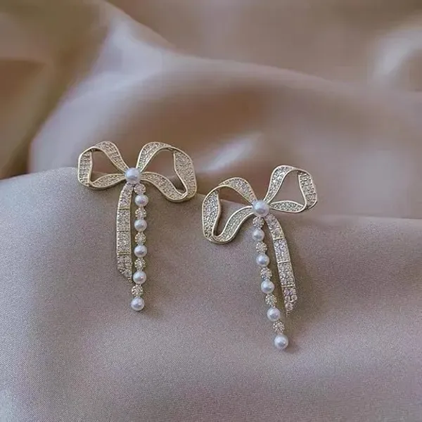 Golden_Crystal_Rhinestone_Bow_Pearl_Accent_Earrings_For_Women